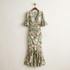 Anastasia floral maxi dress in Sage Green on a hanger