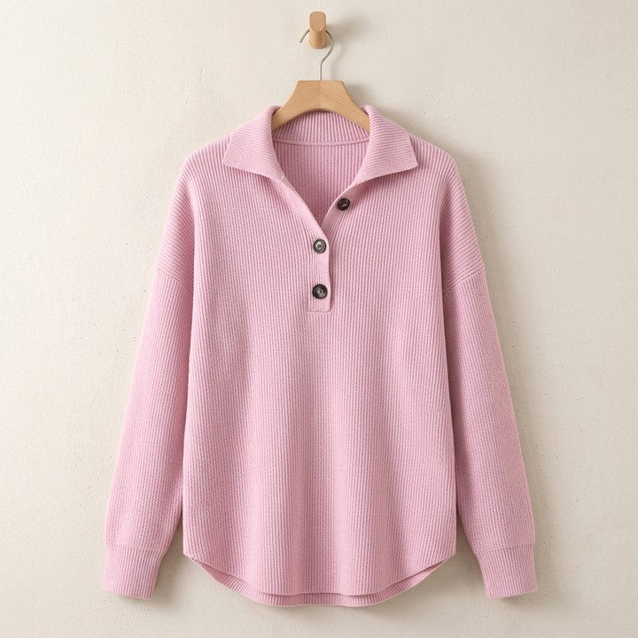 Constance polo-collar button jumper in Blush Pink on a hanger
