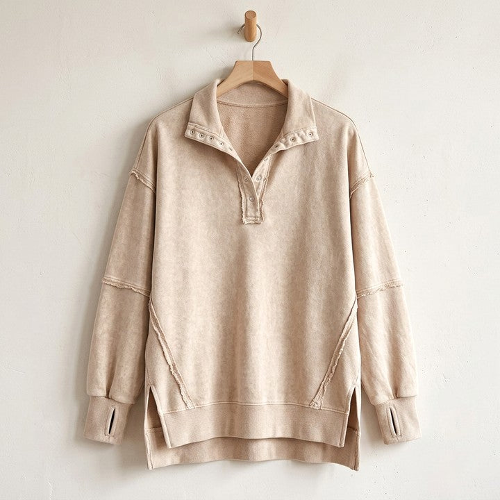 Hazel raw-edge henley sweatshirt on a hanger