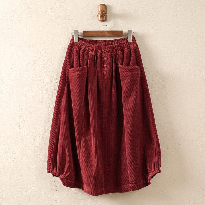 Hortense elastic-waist midi skirt in Red on a hanger