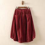 Hortense elastic-waist midi skirt in Red on a hanger