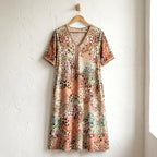 Iris flowing midi dress in Beige, on a hanger