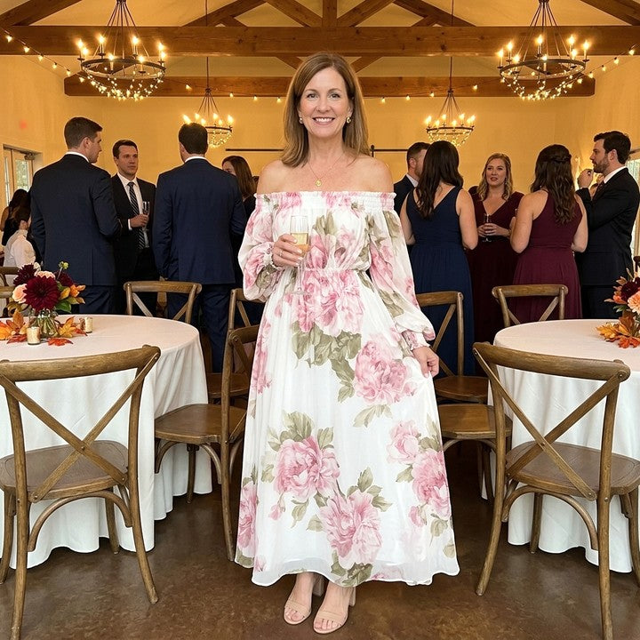 Rosalie floral off-shoulder maxi dress in White, worn at an evening celebration