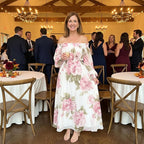 Rosalie floral off-shoulder maxi dress in White, worn at an evening celebration
