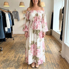 Rosalie floral off-shoulder maxi dress in White, worn in a boutique